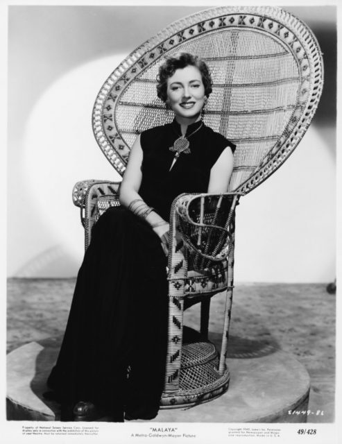 Studio portrait of actress Valentina Cortese sitting in a peacock chair, wearing a long dress, as she appears in the movie ‘Malaya’, for MGM Studios, 1949. (Photo by Archive Photos/Getty Images)