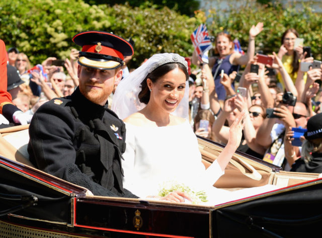 Harry and Meghan in their wedding carriage