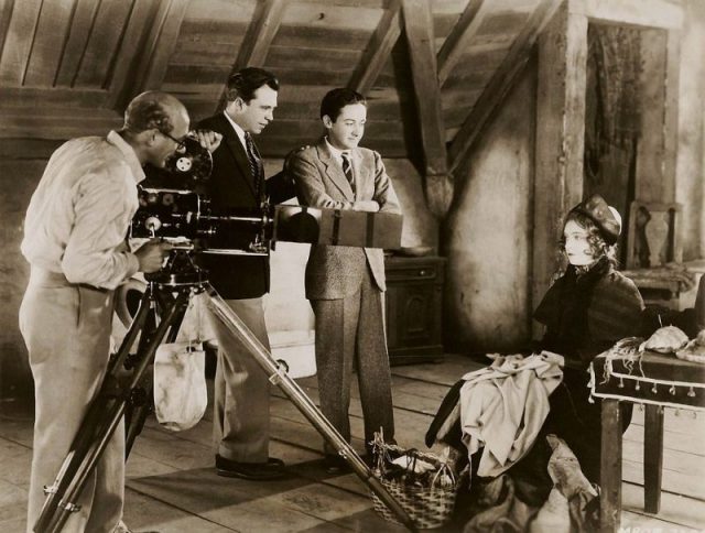 On the set of La Bohème. From left to right: cinematographer Hendrik Sartov, director King Vidor, producer Irving Thalberg and actress Lillian Gish