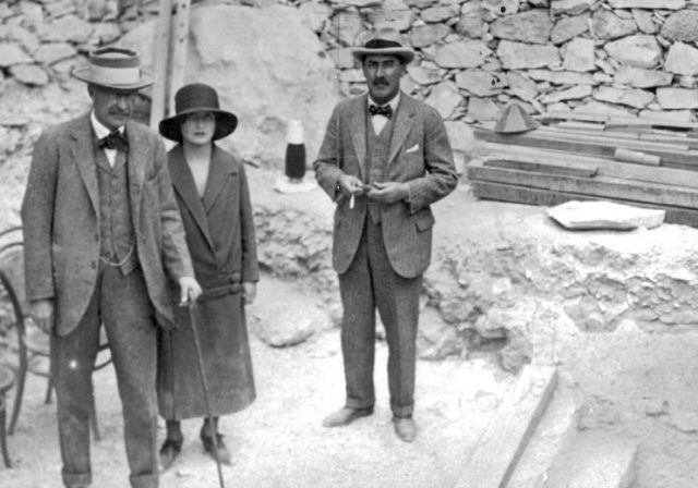 From left to right: Lord Carnarvon, who financed the effort; his daughter, Lady Evelyn Herbert; and Howard Carter. The three are standing at the steps leading to the freshly uncovered tomb of Tutankhamun.