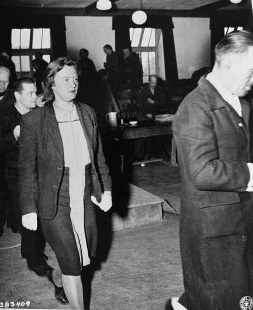 Ilse Koch leaves the courtroom with her co-defendants during the trial of former camp personnel and prisoners from Buchenwald.