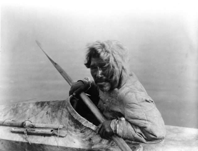 Inuit man in kayak, photo by Edward S. Curtis. Noatak, Alaska, c. 1929.