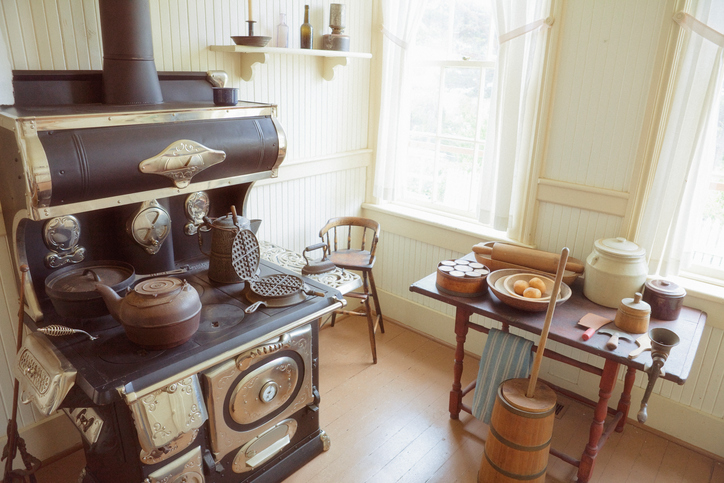 A busy antique kitchen from the 19th century. Seems like the perfect place to drink your morning coffee.