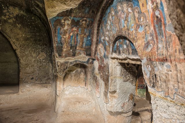 A chapel with some remains of frescoes, inside Vardzia, Georgia.
