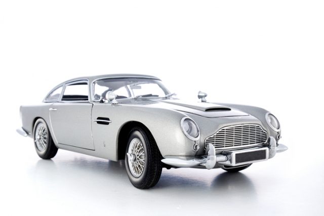 Beaconsfield, UK – September 15, 2015: A model of Aston Martin’s iconic DB5. Released in 1963, it found global fame as the gadget-laden transport of the world’s most famous secret agent, James Bond.