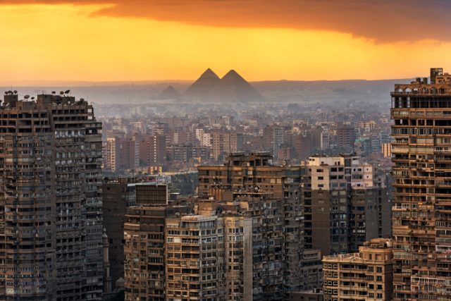 Landscape of Cairo, with the Giza pyramids behind.