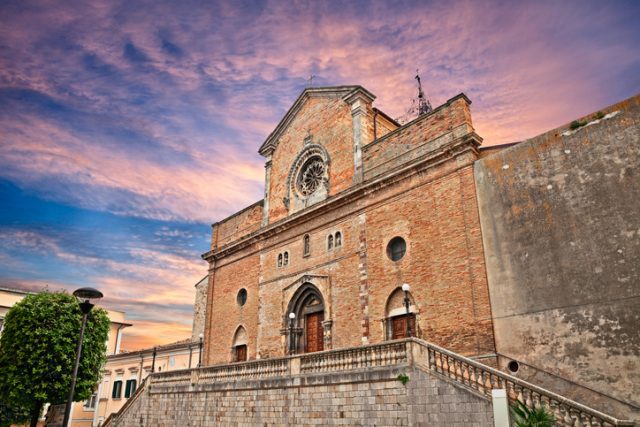 Atessa, Chieti, Abruzzo, Italy: the medieval catholic cathedral of Saint Leucio at sunset in the old town.