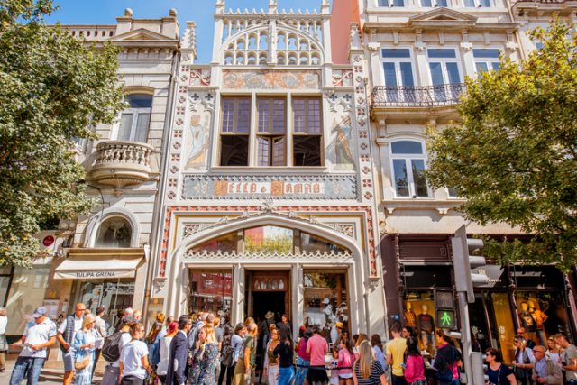 PORTO, PORTUGAL – September 24, 2017: View on the Lello Bookstore facade with tourists waiting to enter. It is one of the oldest bookstores in Portugal.
