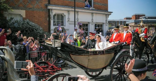 Prince Harry, Duke of Sussex, and Meghan, Duchess of Sussex, leave Windsor Castle.