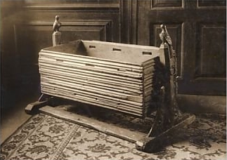 Photograph of the cradle of Henry V of England, formerly at Monmouth, then donated in 1912 by King George V to the Museum of London.
