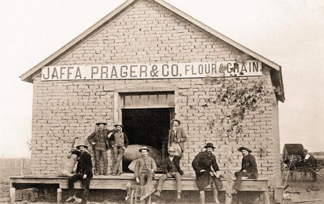 Sheriff Pat Garrett (2nd from right) with friends on the porch in Roswell, New Mexico.