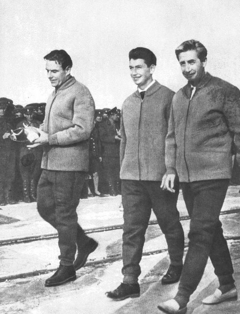The Voskhod crew (Komarov, Yegorov, and Feoktistov) at the Baikonur Cosmodrome after the end of their mission.