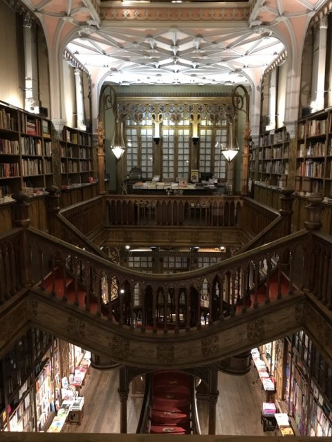 With it’s beautiful wooden bookshelves, ornately carved balustrades, and open-plan balconies, Livraria Lello has the atmosphere of an ancient library
