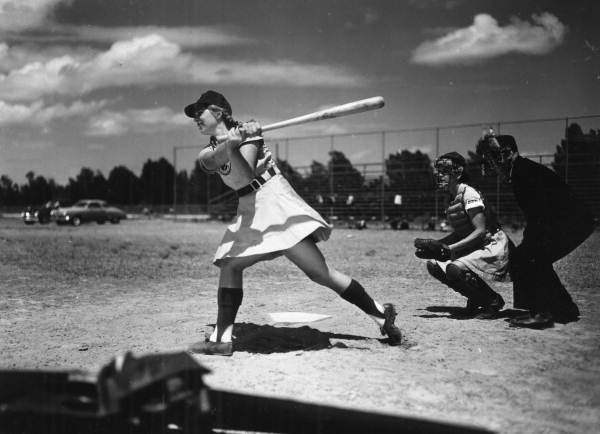 View of All-American Girls Professional Baseball League member Dottie Schroeder getting a hit.