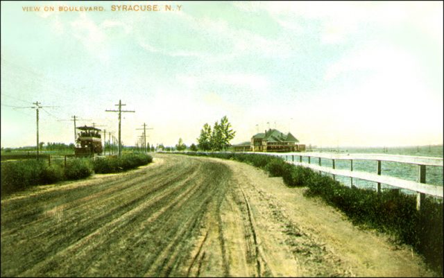 View of Onondaga Lake from Onondaga Boulevard in Syracuse, New York, c.1900, with electric trolley on the left.