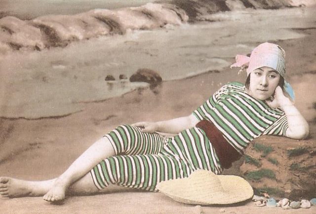 Strike a pose: A woman in a stripped-style swimwear circa 1905.