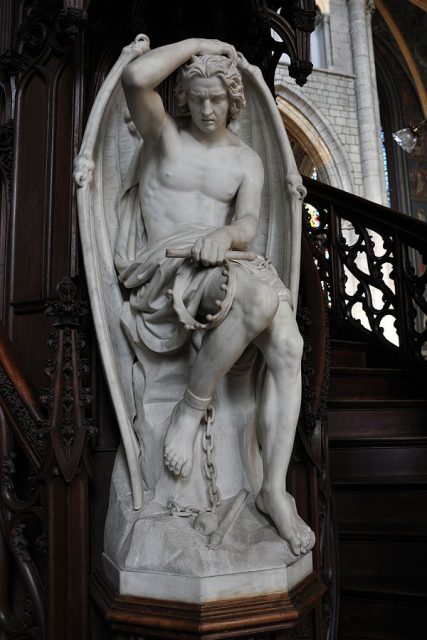 The Genius of Evil installed on the pulpit of the cathedral in Liège.