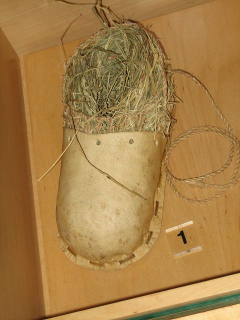 A shoe as worn in prehistoric times, BATA shoe museum – modern reproduction. Photo by Sheila Thomson CC BY 2.0