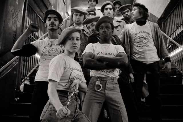 A team of “Guardian Angels” meets on subway stairs as they get ready to go on patrol in part of the city’s 230-mile subway system. (Photo Credit: Bettmann / Contributor / Getty Images)