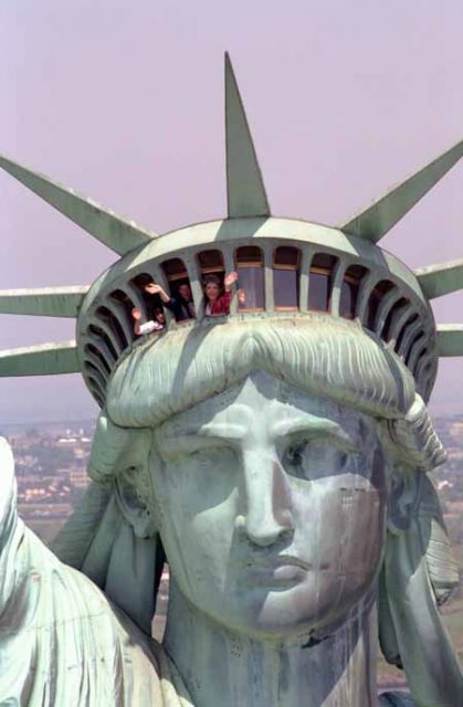 On 7/4/1986 Nancy Reagan waves while visiting the Statue of Liberty in New York City.