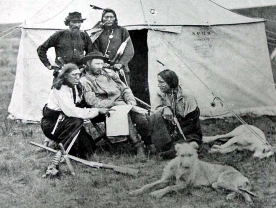 Custer and Bloody Knife (kneeling left), Custer’s favorite Indian Scout.