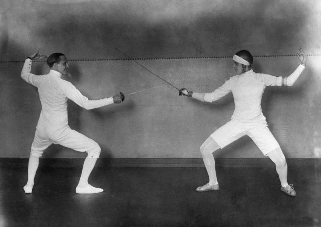 Italian fencer Nedo Nadi (left), winner of gold medals in fencing in the 1912 and 1920 Olympic Games, fences with German fencer Helene Mayer, herself an Olympic gold medalist in the 1928 Games.