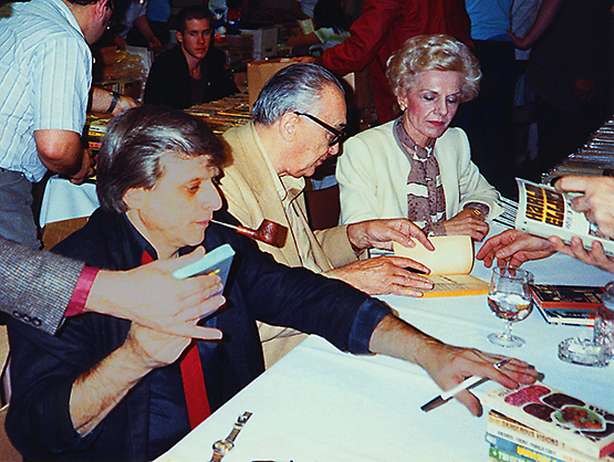 Harlan Ellison (left), A. E. van Vogt, and Lydia van Vogt in this photo from some time in the mid-1980s. Copyright 2006 by Galen A. Tripp Photo by Pip R. Lagenta CC BY 2.0