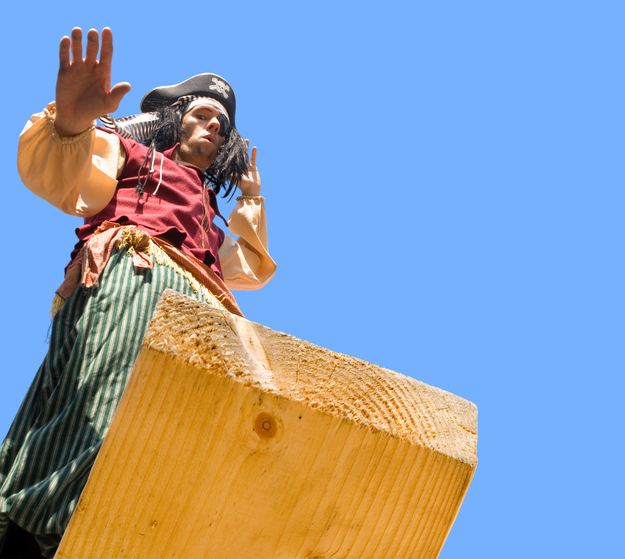 Pirate stands on a plank