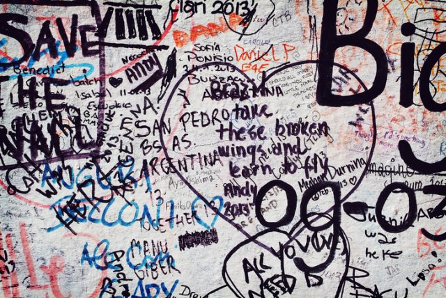 Close-up of a fan-decorated wall in Abbey Road, London.