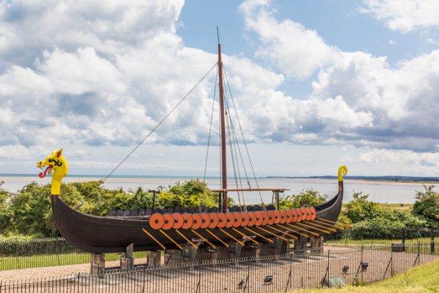 A restored Viking sailing ship, or longboat, at Pegwell Bay in Kent, England.