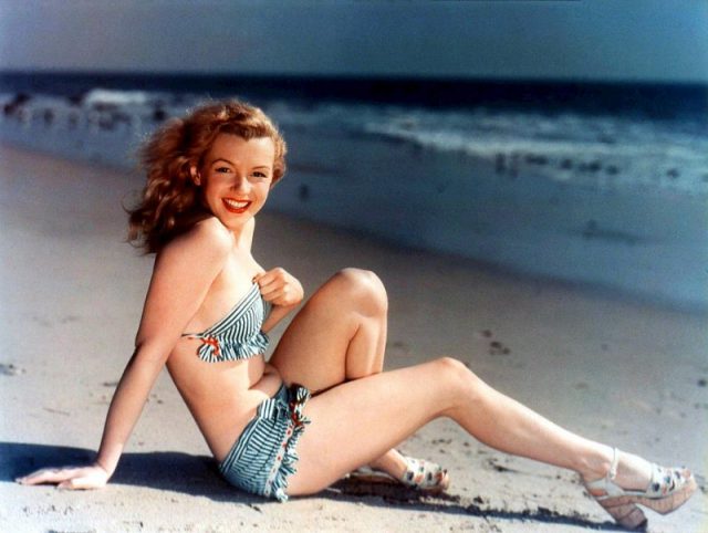Monroe posing for a photo during her modeling career, c.1945.