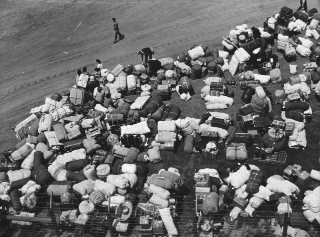 The baggage of Japanese Americans from the west coast, at a makeshift reception center located at a racetrack