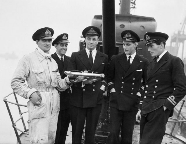 The officers of HMS Seraph, the submarine selected for the operation, on board in December 1943.