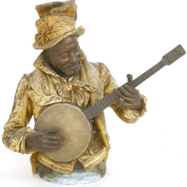 Cold painted spelter figure of a banjo player. Photo courtesy: Sworders