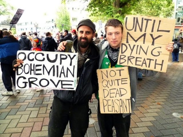 Occupy Bohemian Grove signs from Occupy Portland rally on October 6, 2011. Photo by badlyricpolice CC BY 2.0