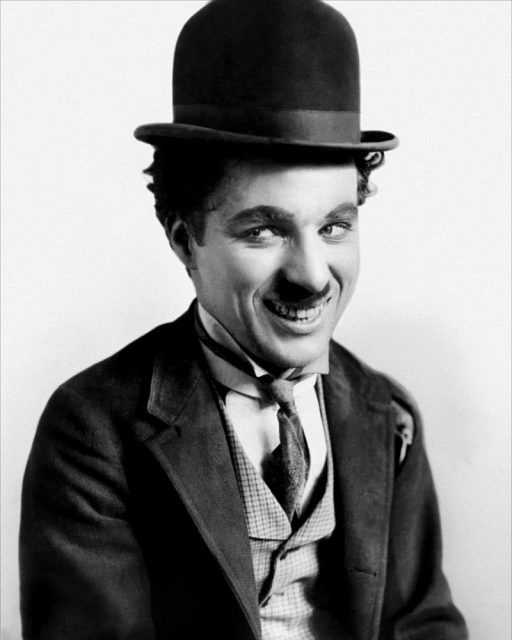Charlie Chaplin as The Tramp.