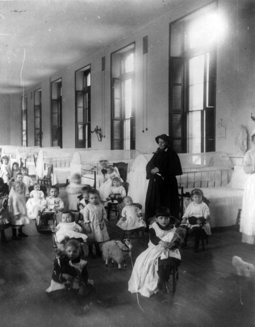 Sister Irene and children at New York Foundling Hospital.