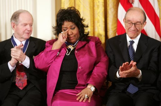 Franklin wipes a tear after being given the Presidential Medal of Freedom on November 9, 2005, at the White House.