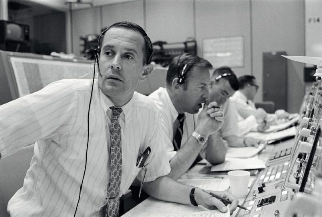 CAPCOM Charles Duke, with backup pilots James Lovell and Fred Haise listening in during Apollo 11’s descent.