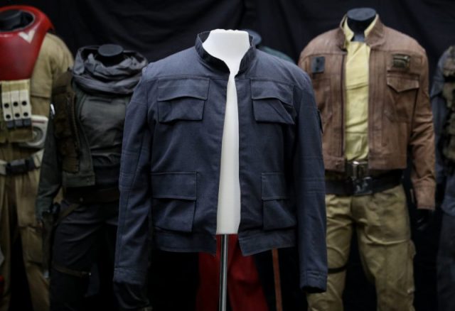 Han Solo’s jacket, as worn by Harrison Ford in Star Wars: The Empire Strikes Back, in front of costumes from Rogue One: A Star Wars story, on display at the Prop Store head office near Rickmansworth ahead of the Entertainment Memorabilia Live Auction on September 20th. Photo by Andrew Matthews/PA Images via Getty Images