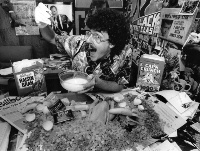 Portrait of American musician, parodist, and comedian Weird Al Yankovic as he poses with various food items during a photo shoot, Los Angeles, California, March 20, 1984. The items are all referenced in his song ‘Eat It,’ a parody of Michael Jackson’s ‘Beat It.’ Photo by Bob Riha, Jr./Getty Images