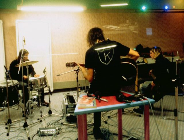 Dave Grohl, Krist Novoselic, and Kurt Cobain – band recording in Hilversum Studios. Photo by Michel Linssen/Redferns