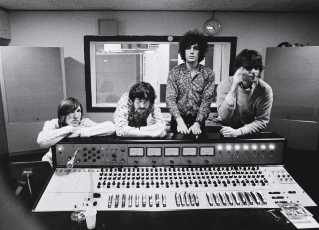L-R: Roger Waters, Nick Mason, Syd Barrett, Rick Wright – posed, group shot, at mixing desk in recording studio control room (Photo by Andrew Whittuck/Redferns)