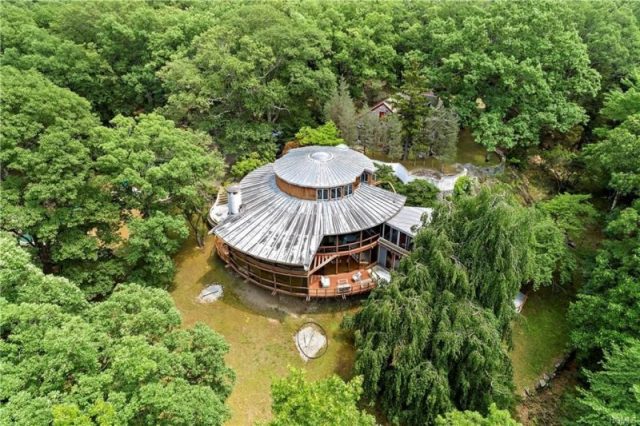 Aerial view of the round property. Photo by Zillow.