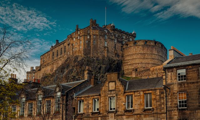 A telephoto shot of Edinburgh Castle against a beautiful blue sky, Scotland, UK.