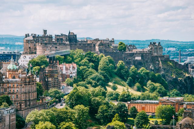 A view of Edinburgh, Scotland, as seen from Calton Hill – July 13, 2017. In the image Edinburgh Castle can be seen on top of the hill in which the Old Town of the Scottish capital is located.