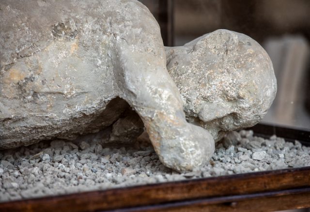 A plaster cast of a man in his last moments. Pompeii, Italy.