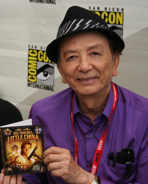Actor James Hong with a copy of Big Trouble in Little China. Photo by Carter McKendry CC BY 2.0