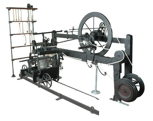 The only surviving example of a spinning mule built by the inventor Samuel Crompton. The mule produced high-quality thread with minimal labour. Photo by Pezzab CC BY-SA 3.0