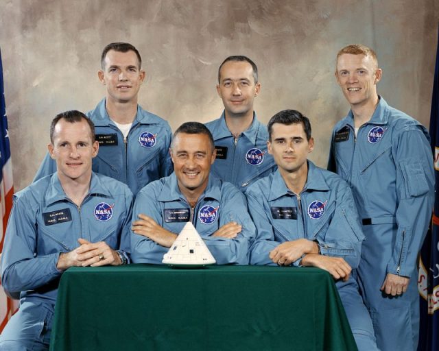 Official portrait of prime and backup crews for AS-204, as of April 1, 1966. The backup crew (standing) of McDivitt (center), Scott (left) and Schweickart were replaced by Schirra, Eisele and Cunningham in December 1966.